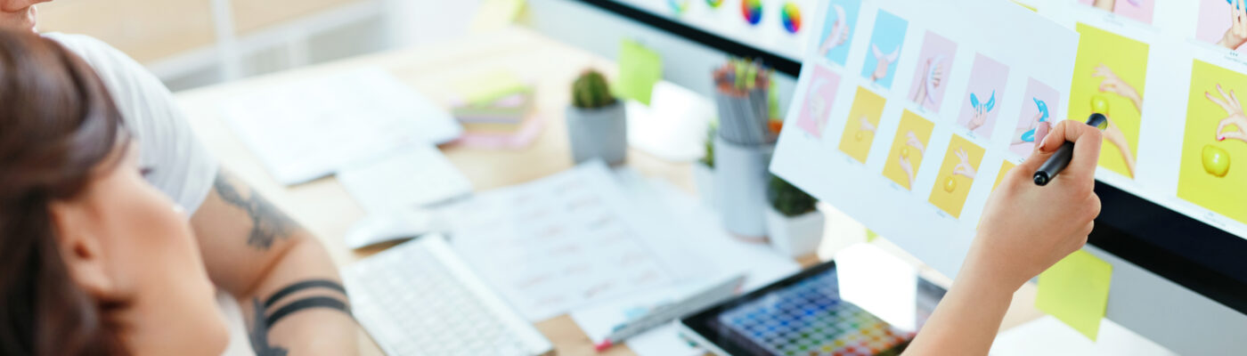 Web Design. Close Up Of Designers Working On Web Project. People Sharing Ideas Working On Computer In Office. HIgh Resolution