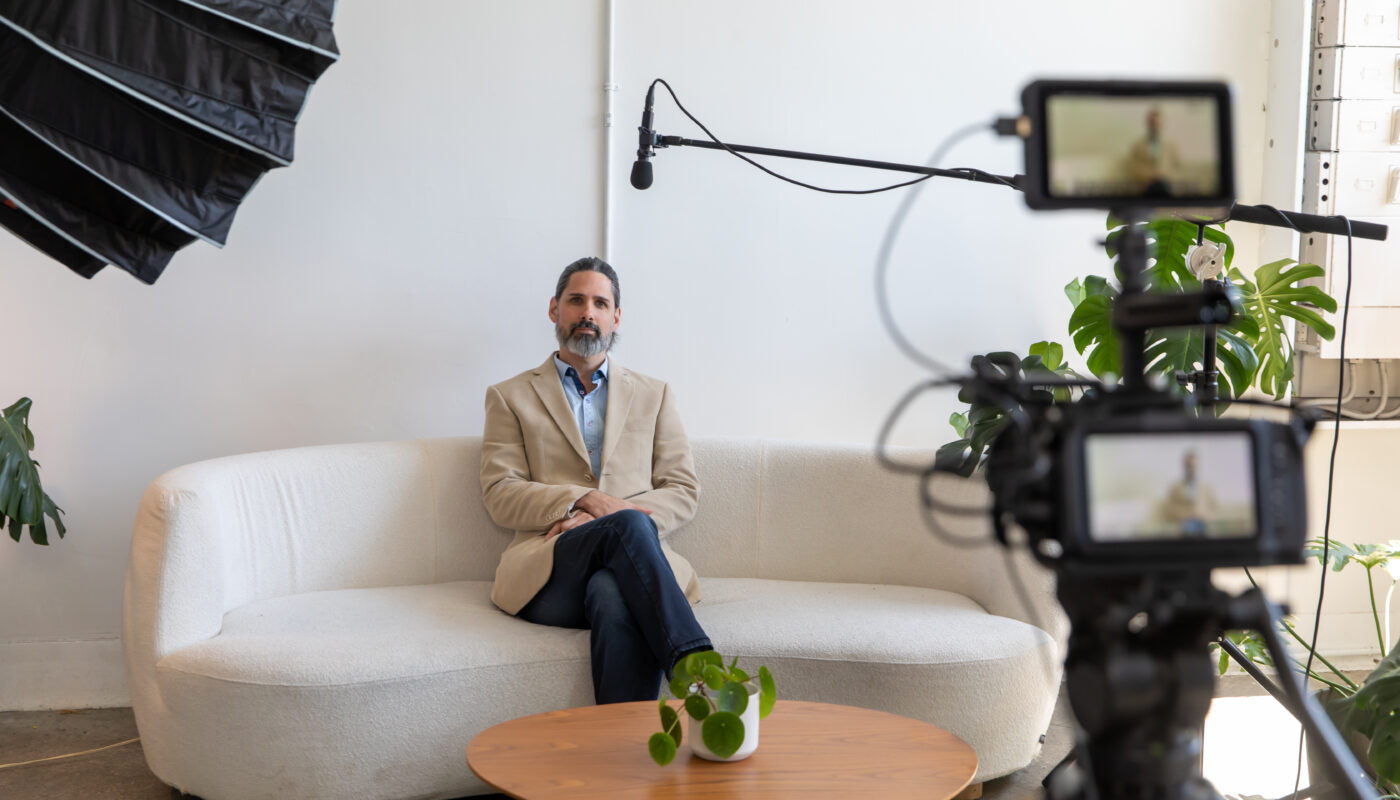 Behind the Scenes on Video Shoot of Man Being Interviewed on Cam